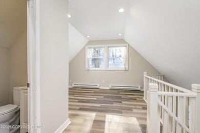 Welcome to this charming chalet style home offering 2 bedrooms