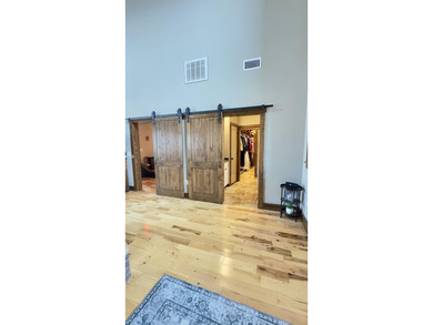 Experience luxury golf course living in the prestigious Cooper's