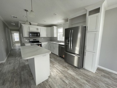 CURRENTLY UNDER CONSTRUCTION! Welcome to Mid Florida Lakes, a - photo 2