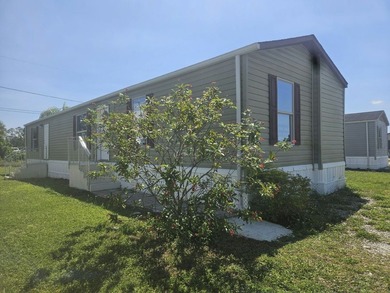 Own your own home in a quiet, well-maintained neighborhood! This - photo 1