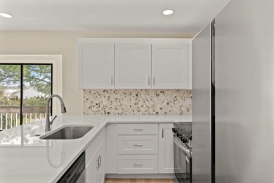 Lake front! This freshly updated condo offers a comfortable and - photo 12