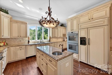 LUXURY LIVING IN PELLYN WOOD! This custom residence built by - photo 9