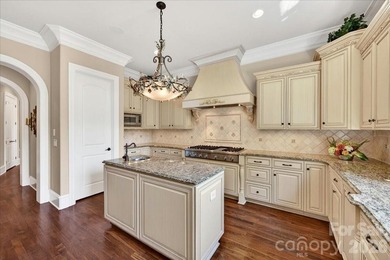 LUXURY LIVING IN PELLYN WOOD! This custom residence built by - photo 10