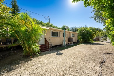 This 1,200 sq. ft. 2-bedroom, 2-bathroom home sits on a generous - photo 25