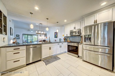 This end-unit townhome is located in desirable Satellite Beach - photo 6