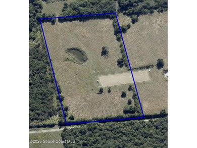 Discover 4.69 acres of peaceful Florida countryside with room to - photo 3