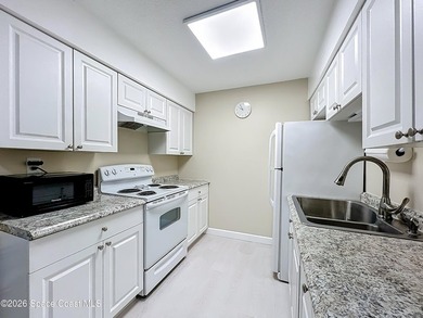 Renovated easy maintenance first floor unit updated with - photo 13