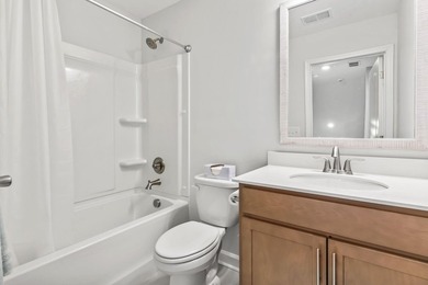 Three-bedroom, three-bathroom Craftsman-style home with a - photo 24