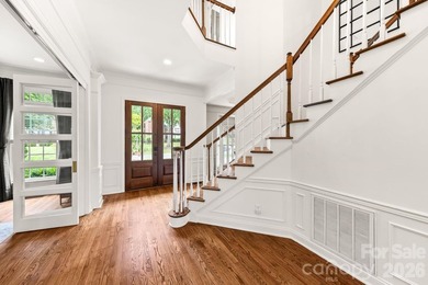 From the oversized Mahogany front doors to the designer-curated - photo 7