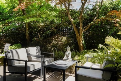 Tucked away behind your own private fenced garden oasis, this - photo 11