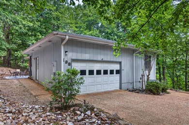 Enjoy this cute home on a private 1/3 acre lot between Lake - photo 34