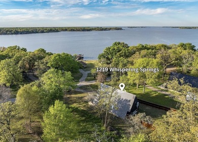 Elevated open water views pair with lake access at this A-frame - photo 3