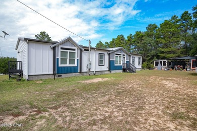 Lake Home For Sale in Chipley, Florida