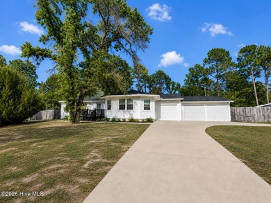 Welcome to this cute and cozy home situated on a rare 1.01-acre - photo 1