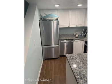 PARADISE! This lovely turnkey unit boasts an AC unit replaced - photo 6