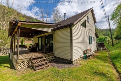 Inviting 3-bedroom, 2 bath home on 1.37 acres featuring an open - photo 2