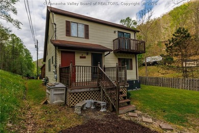 Inviting 3-bedroom, 2 bath home on 1.37 acres featuring an open - photo 4
