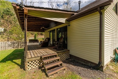 Inviting 3-bedroom, 2 bath home on 1.37 acres featuring an open - photo 5
