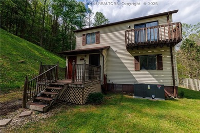 Inviting 3-bedroom, 2 bath home on 1.37 acres featuring an open - photo 6