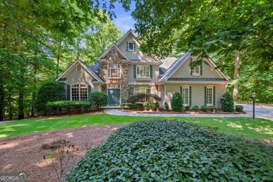 Welcome to this exceptional custom-built home in the prestigious - photo 1