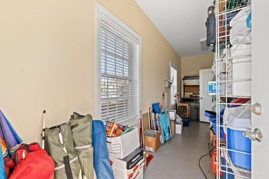 Nestled in a beautiful lakefront setting, this all-brick - photo 20