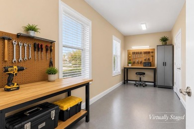 Nestled in a beautiful lakefront setting, this all-brick - photo 21