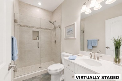 Nestled in a beautiful lakefront setting, this all-brick - photo 32