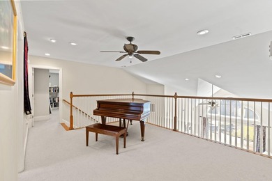 Nestled in a beautiful lakefront setting, this all-brick - photo 33