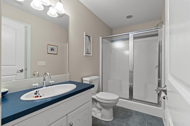 Nestled in a beautiful lakefront setting, this all-brick - photo 44