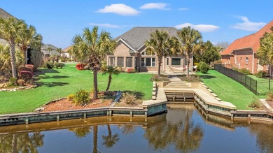 Nestled in a beautiful lakefront setting, this all-brick - photo 50