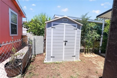 Welcome to this 4-bedroom, 2-bathroom manufactured home situated - photo 12