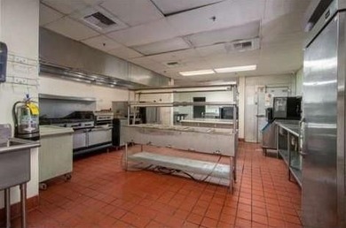 This spacious three-story assisted living facility at 5690 State