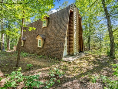 Perched atop scenic Justice Drive, this charming and truly - photo 4