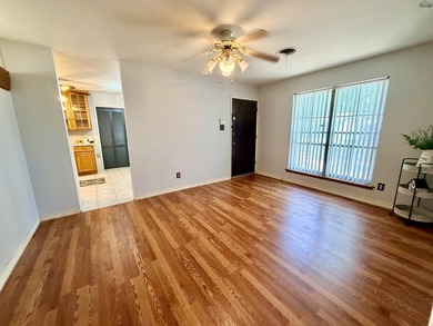 Charming 3-bedroom, 1.5-bath home with Pergo wood and tile - photo 4