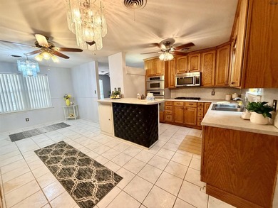 Charming 3-bedroom, 1.5-bath home with Pergo wood and tile - photo 9