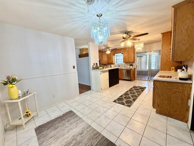 Charming 3-bedroom, 1.5-bath home with Pergo wood and tile - photo 10