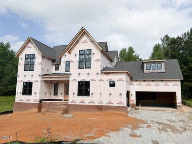 Set on a private .97-acre, pool-ready homesite, this - photo 1