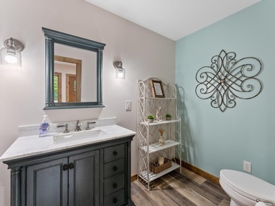 Enjoy this 3 bdrm. 3.5 bath lakefront single story home with - photo 12