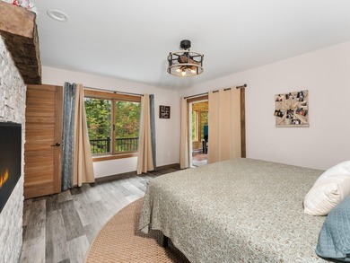 Enjoy this 3 bdrm. 3.5 bath lakefront single story home with - photo 16