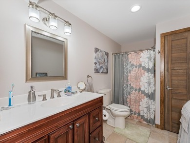 Enjoy this 3 bdrm. 3.5 bath lakefront single story home with - photo 17