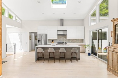 Recently transformed with a stylish new renovation, this - photo 10