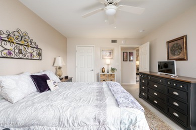 This updated, perfectly situated condo in the desirable Paradise