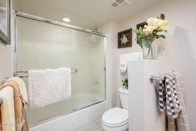 This updated, perfectly situated condo in the desirable Paradise