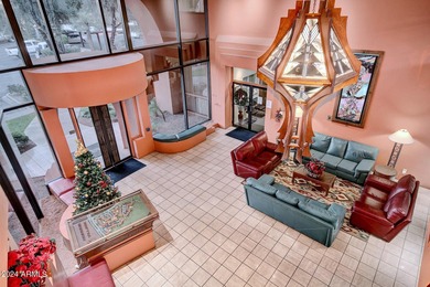 This updated, perfectly situated condo in the desirable Paradise