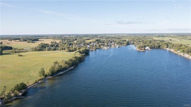 Looking for a generous lot with pristine waterfront in an - Lake Acreage For Sale in Three Mile Bay, New York