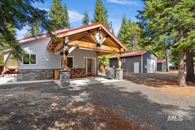NEW PRICE! Tucked away on a peaceful, fenced .49-acre wooded lot - photo 1