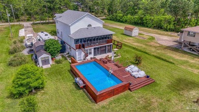 Bay Front home offering 3 bedrooms, 2.5 bathrooms, and a bonus - photo 2