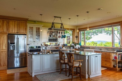 Perched atop Spruce Mountain, this stunning 36-acre estate - photo 11