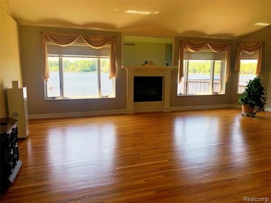 Waterfront, Lake Orion Schools. Over an acre with 244 feet on - photo 11