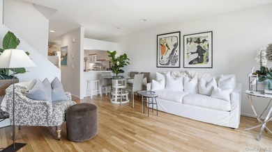 Welcome to 49 Canoe Place Rd, Unit 416, a charming coastal - photo 12